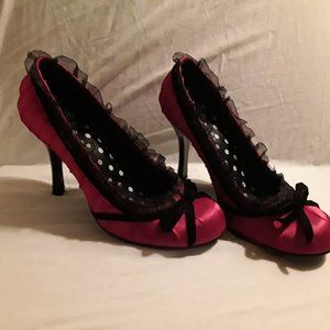 Red satin pumps
